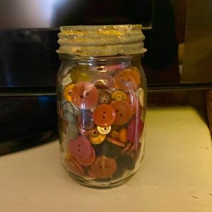 Pint size Mason jar w/ vintage lid full of buttons